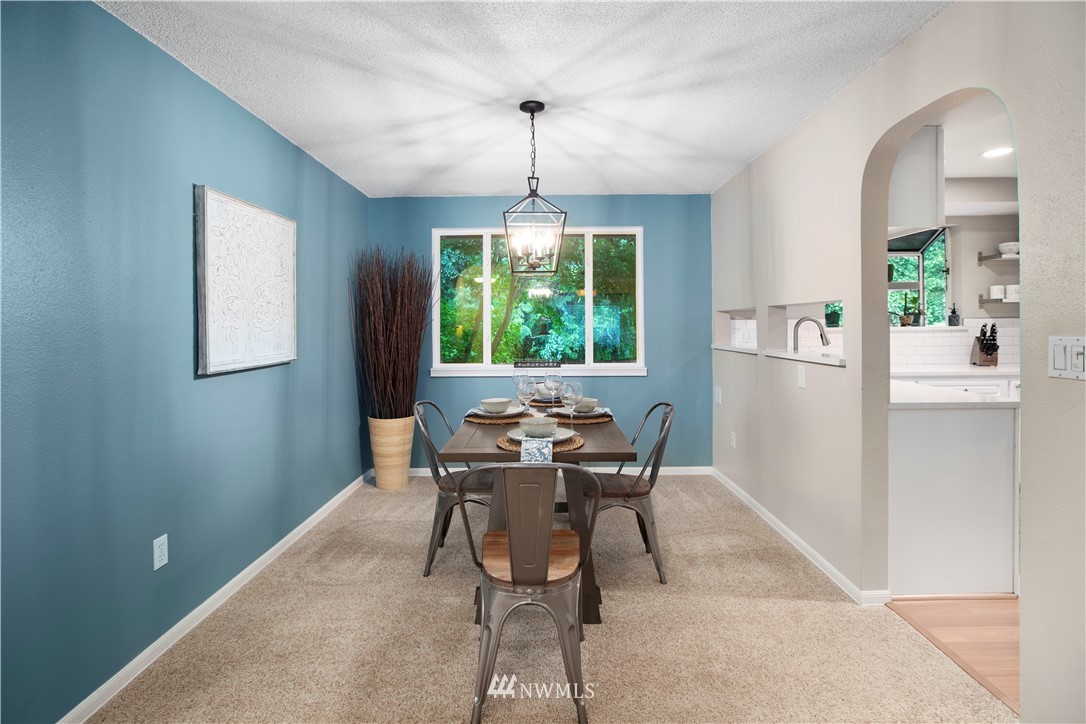 23625 48th Avenue Southeast Bothell, WA 98021 - Photo 11 of 40 a dining room with furniture and window