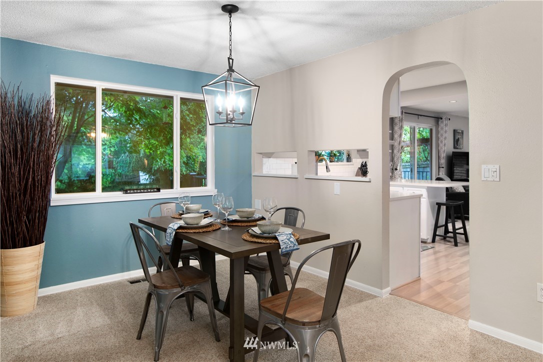 23625 48th Avenue Southeast Bothell, WA 98021 - Photo 12 of 40 a view of a dining room with furniture window and outside view