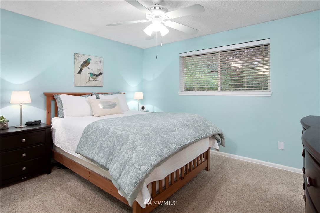 23625 48th Avenue Southeast Bothell, WA 98021 - Photo 19 of 40 a bed room with a bed and a window
