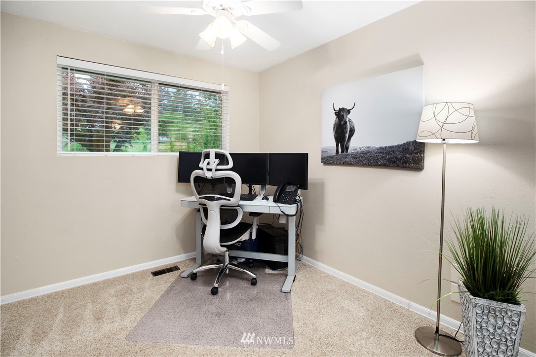 23625 48th Avenue Southeast Bothell, WA 98021 - Photo 25 of 40 a view of a workspace with furniture and a window