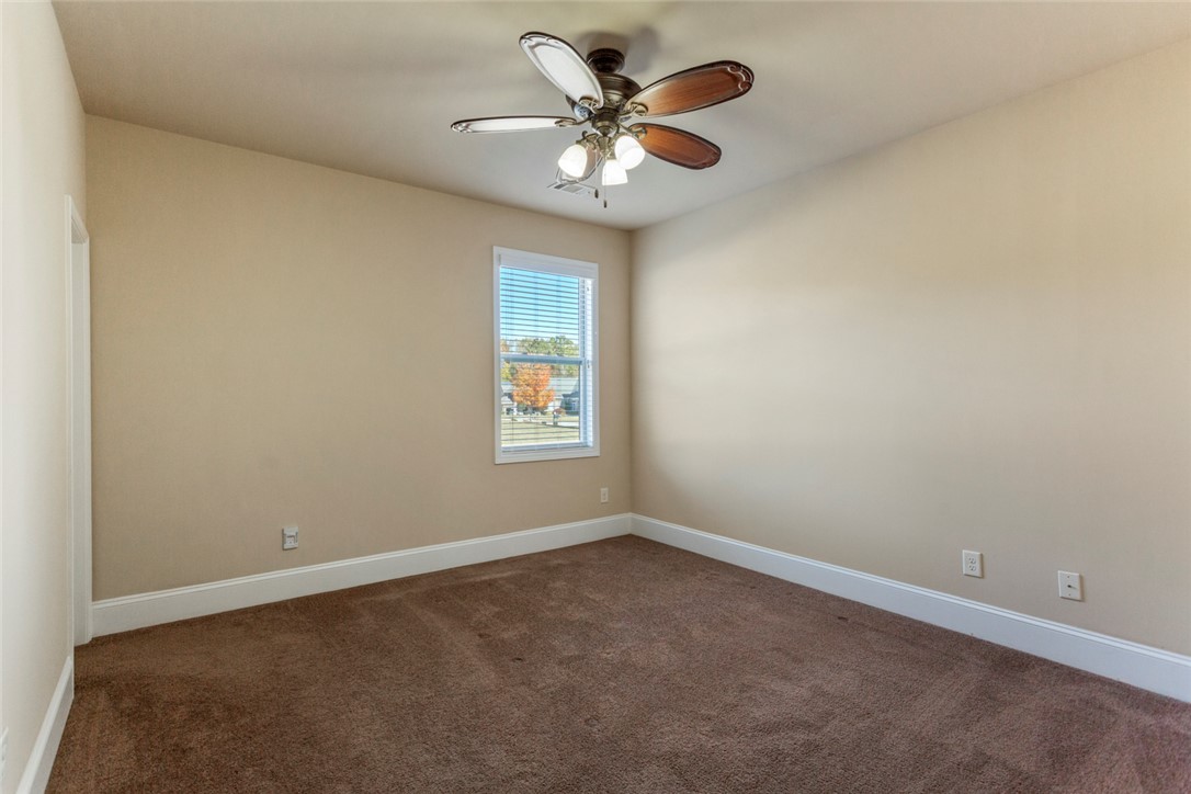 1005 Winmar Drive Anderson, SC 29621 - Photo 22 of 50 This spacious bedroom offers ample natural light and a comfortable atmosphere for rest and relaxation.