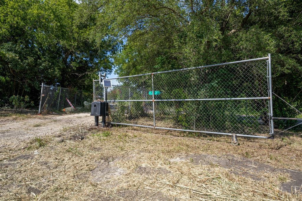 1065 Bluff Springs Road Ferris, TX 75125 - Photo 5 of 11 a view of a fence in the backyard