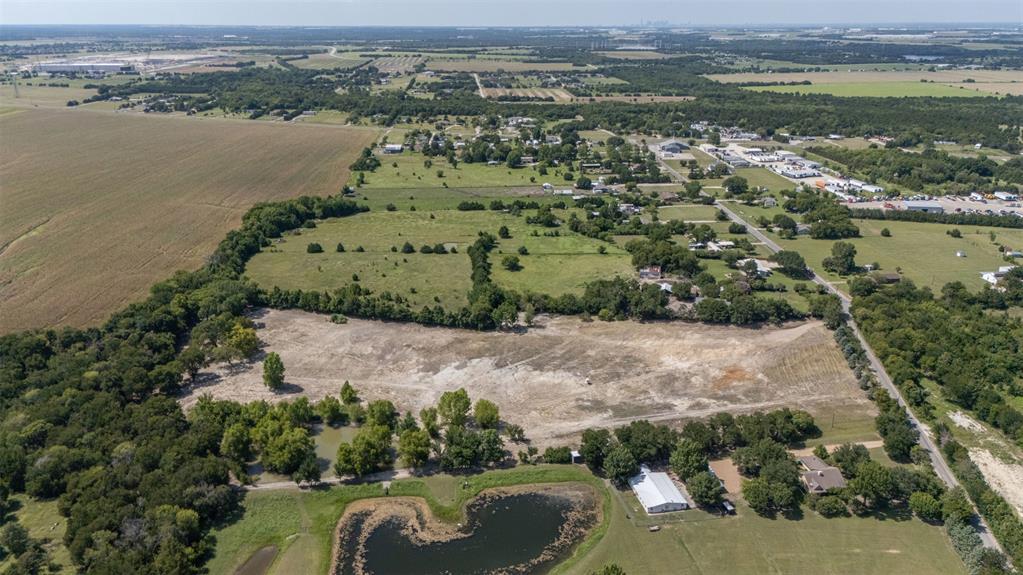 1065 Bluff Springs Road Ferris, TX 75125 - Photo 9 of 11 an aerial view of a houses with outdoor space