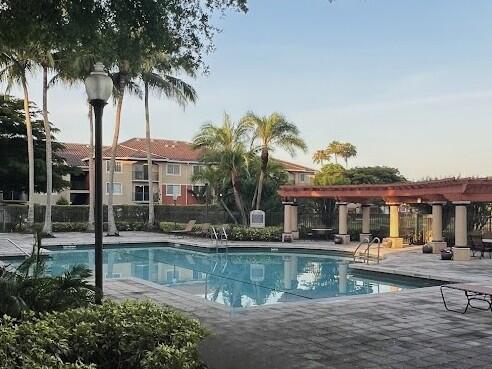 4197 Haverhill Road, Unit 212 West Palm Beach, FL 33417 - Photo 31 of 34 IMG_5868 pool landscape