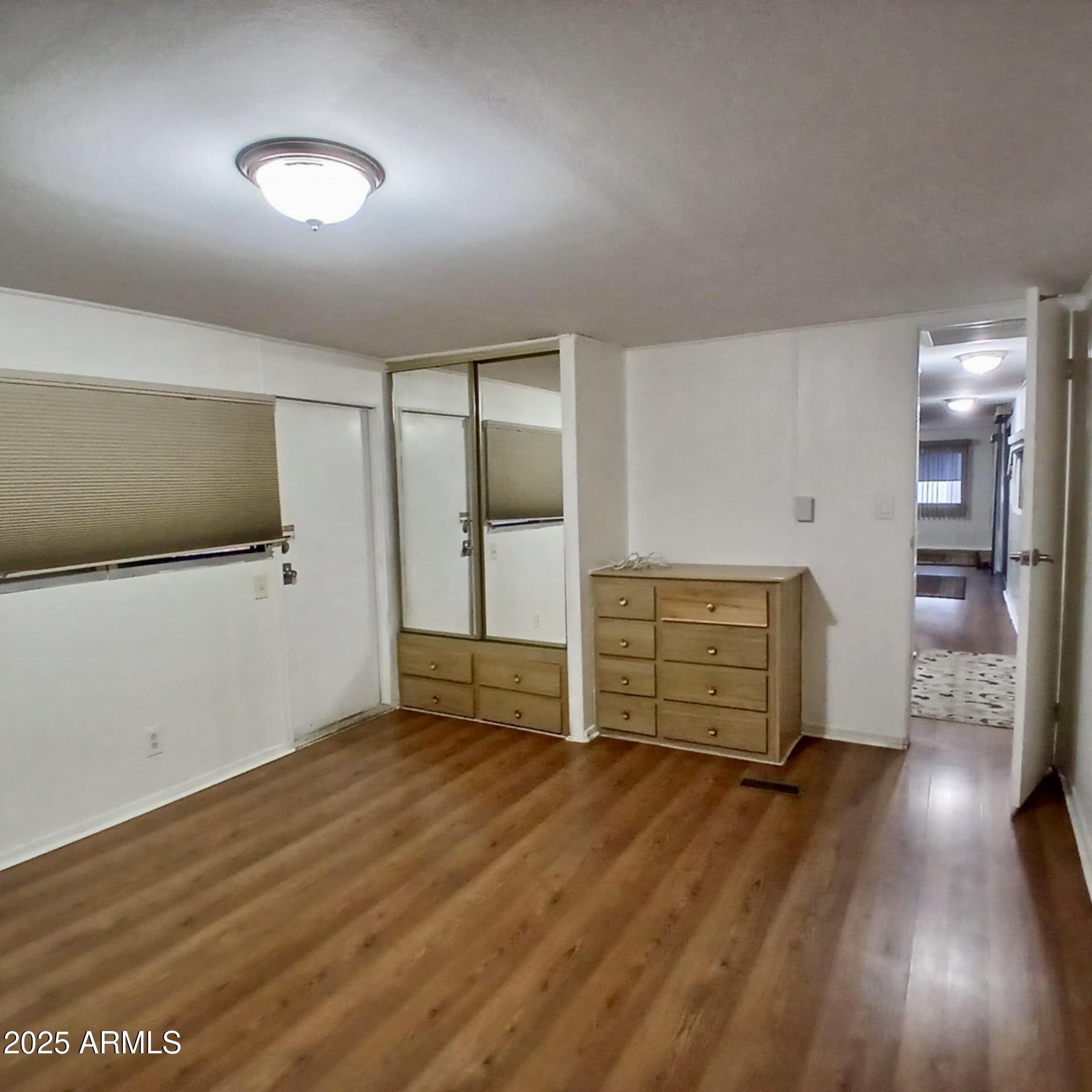303 South Recker Road, Unit 74 Mesa, AZ 85206 - Photo 9 of 16 Bedroom-North window, closet/cabinet