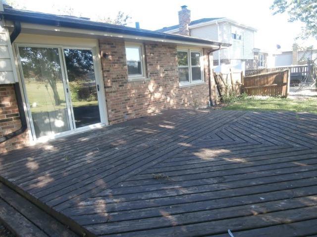 730 Cornfield Road Matteson, IL 60443 - Photo 10 of 12 a view of a building with a porch