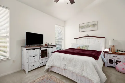 a kitchen with stainless steel appliances granite countertop a refrigerator stove and sink