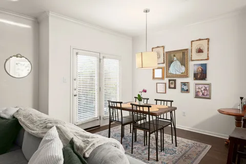 a view of a livingroom with furniture and window
