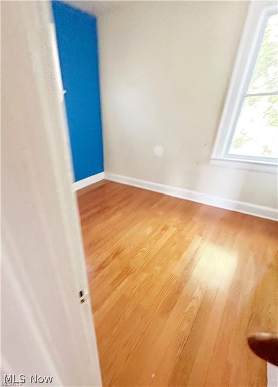 4643 Horton Road Cleveland, OH 44125 - Photo 6 of 21 Spare room featuring light hardwood / wood-style flooring