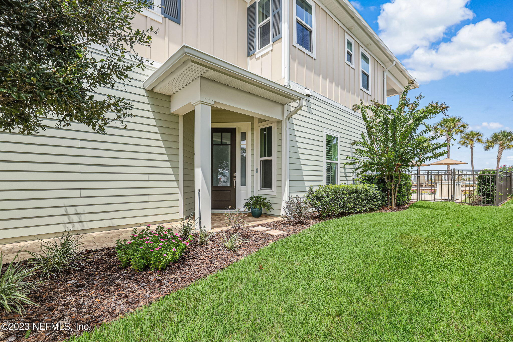235 Rum Runner Way St. Johns, FL 32259 - Photo 12 of 108 a front view of a house with a garden and plants