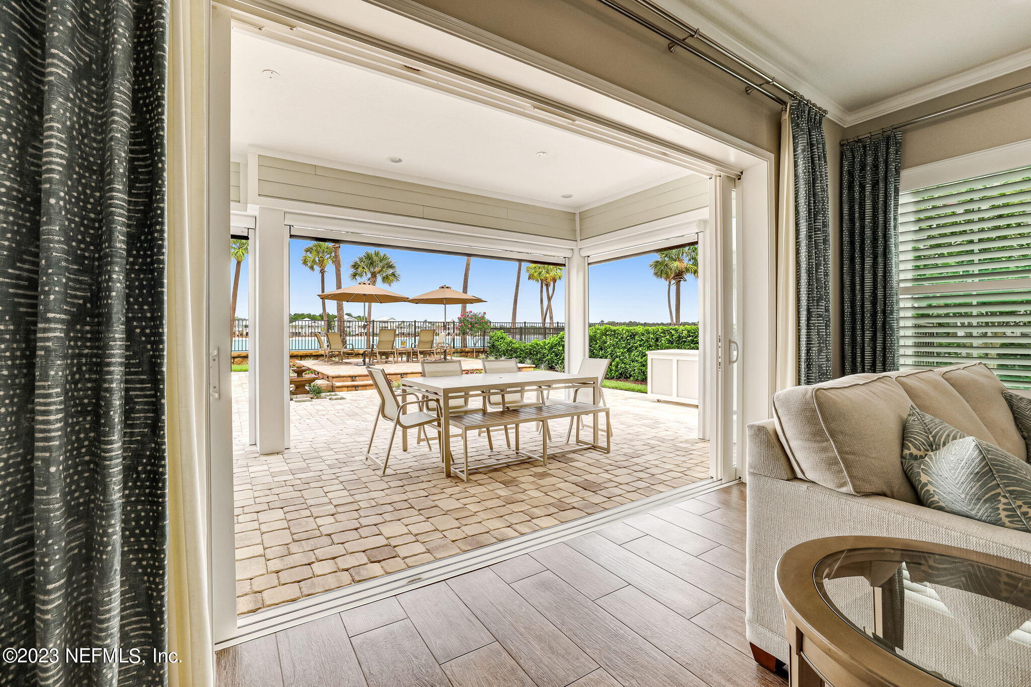 235 Rum Runner Way St. Johns, FL 32259 - Photo 21 of 108 a living room with furniture and a large window