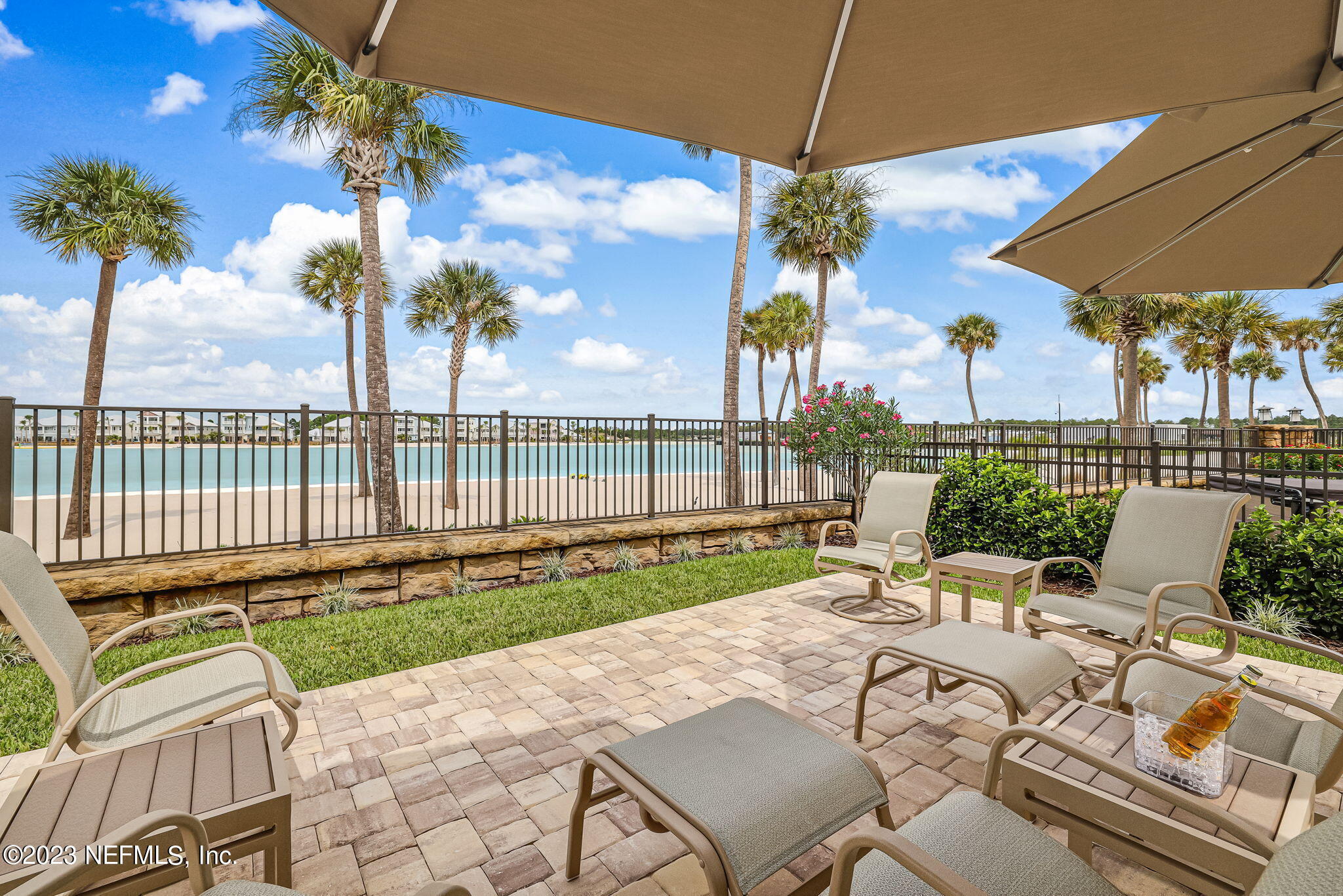 235 Rum Runner Way St. Johns, FL 32259 - Photo 4 of 108 a view of a patio with a table chairs and a backyard