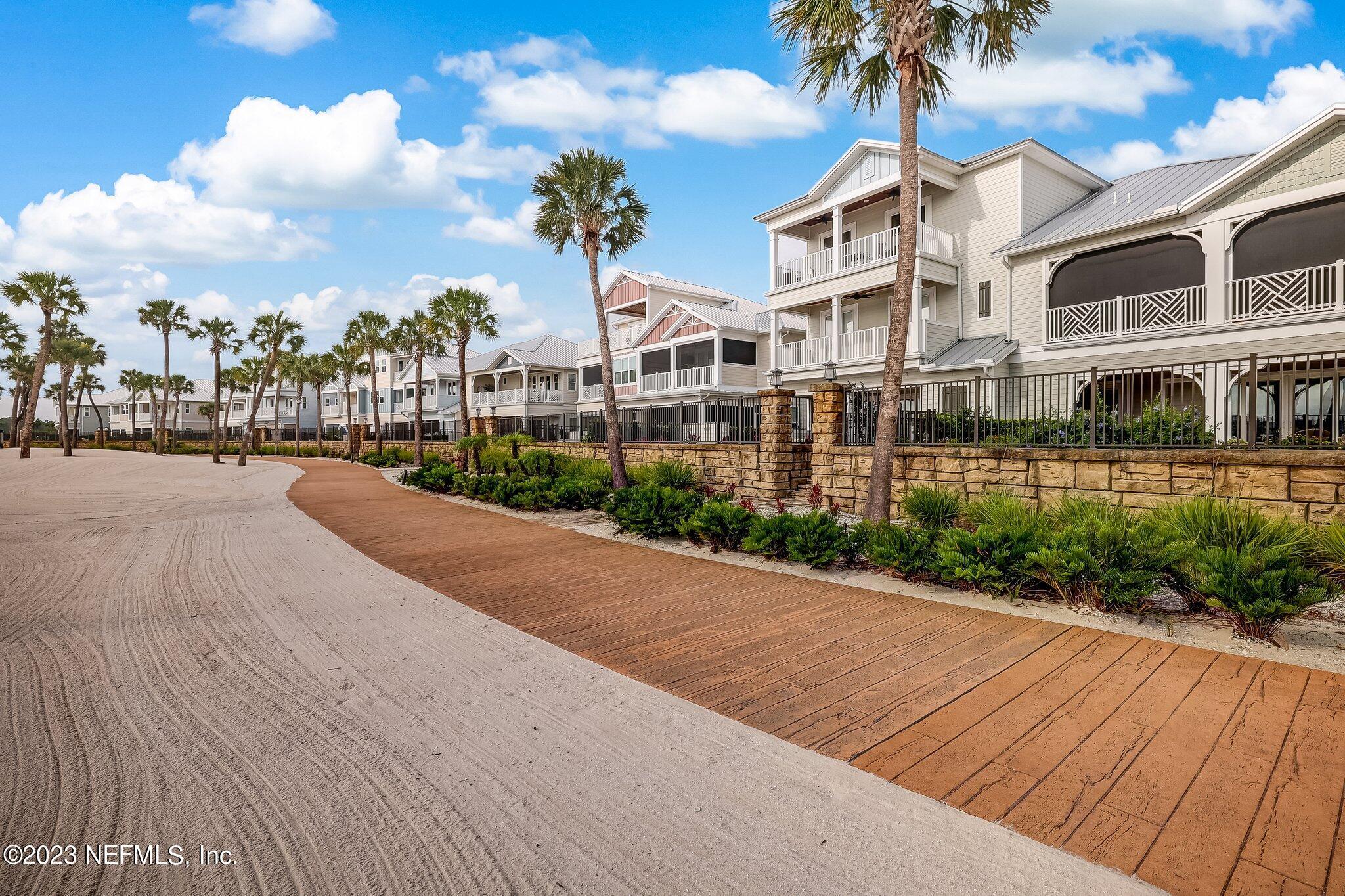 235 Rum Runner Way St. Johns, FL 32259 - Photo 41 of 108 a view of a street with a building in the background