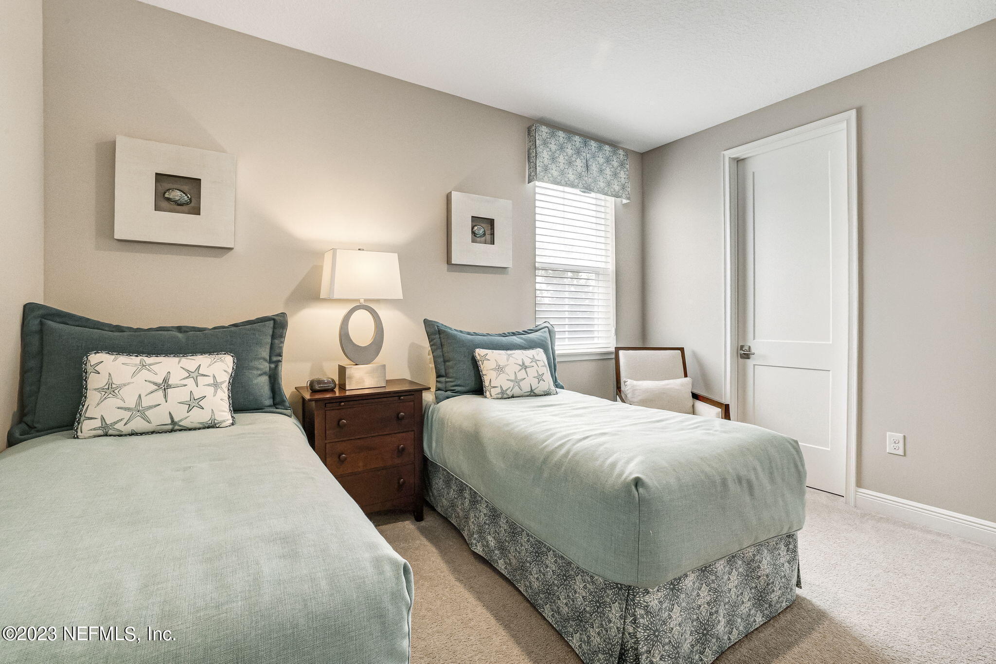 235 Rum Runner Way St. Johns, FL 32259 - Photo 57 of 108 a bedroom with double bed and a window