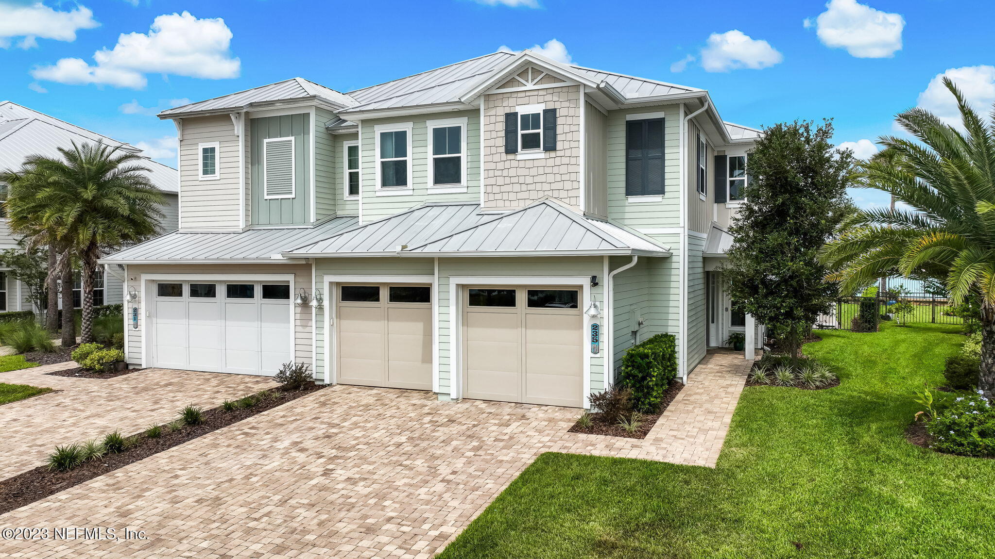 235 Rum Runner Way St. Johns, FL 32259 - Photo 64 of 108 a front view of a house with a garden and plants