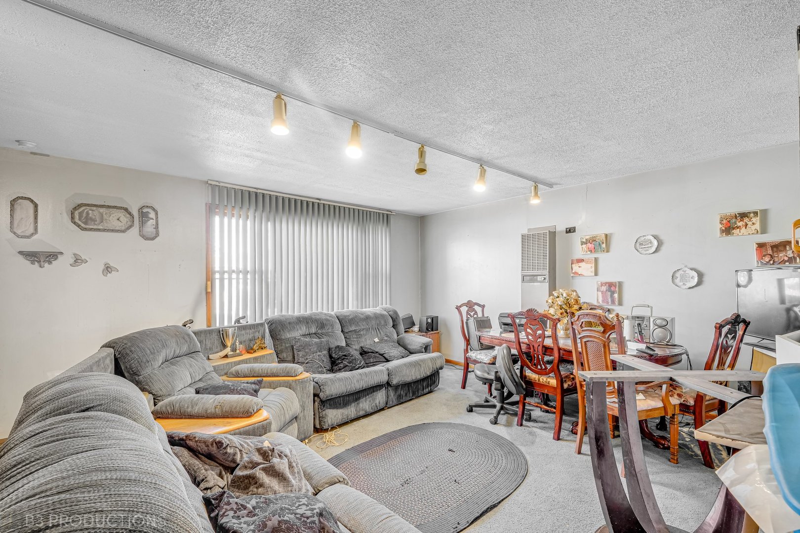 Undisclosed Address Chicago, IL 60620 - Photo 16 of 20 a living room with furniture and a large window