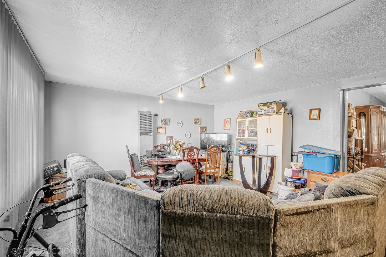 Undisclosed Address Chicago, IL 60620 - Photo 17 of 20 a living room with furniture and a flat screen tv
