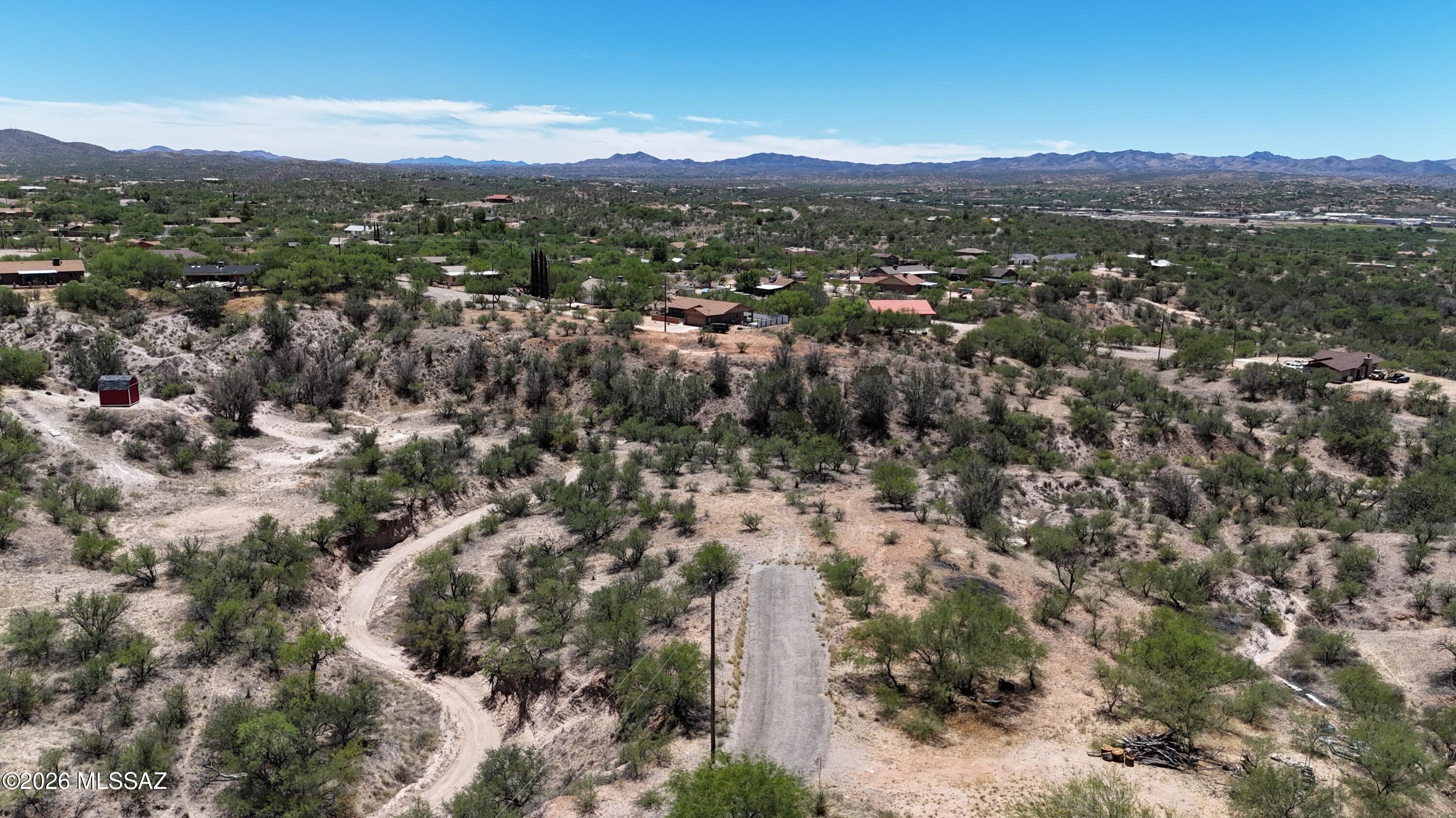 1175 Escorpion Court, Unit 157 Rio Rico, AZ 85648 - Photo 9 of 10 DJI_20260702123559_0895_D_1175EC