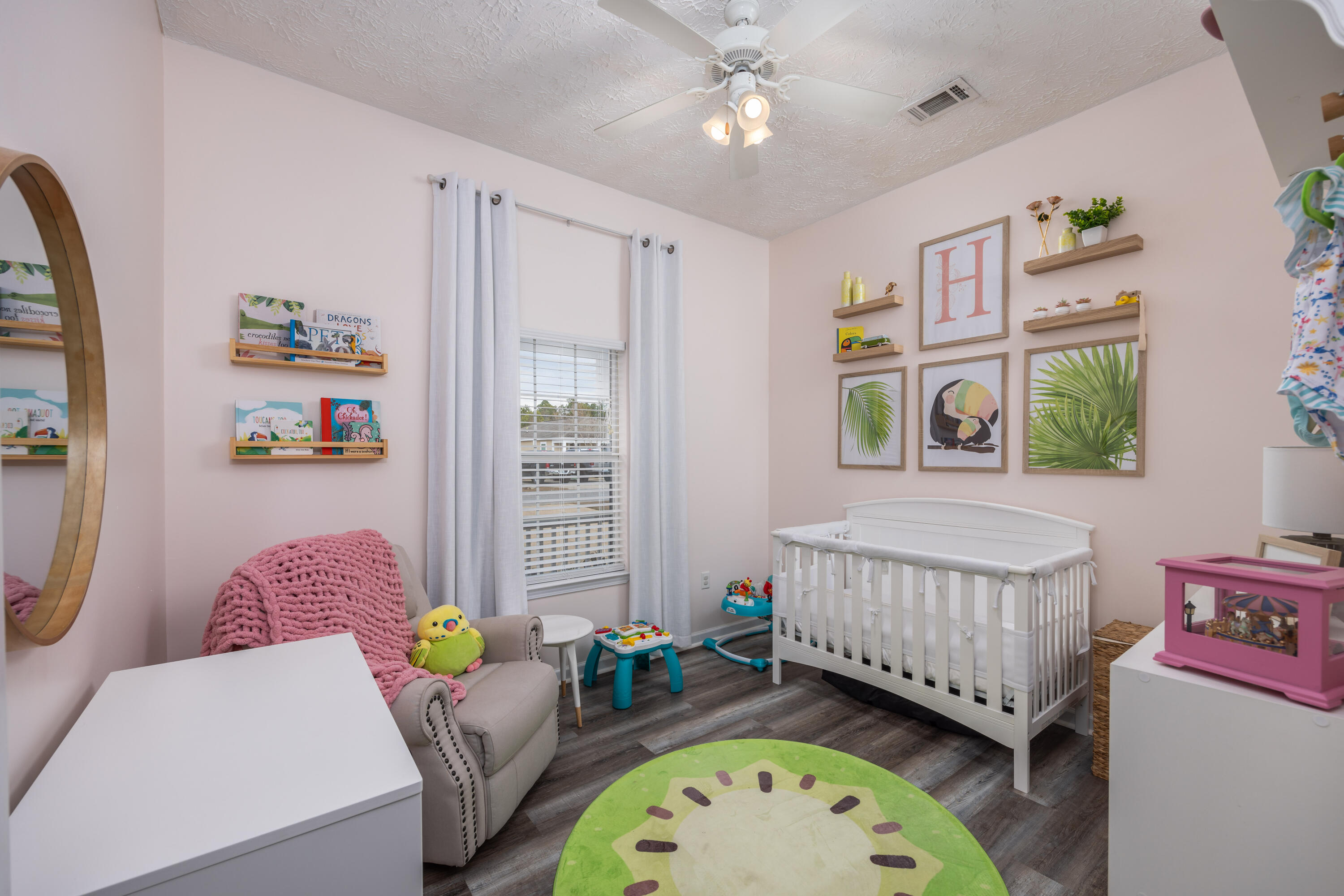 75 Mallot Beach Drive Freeport, FL 32439 - Photo 15 of 25 a bedroom with a bed window and a book shelf