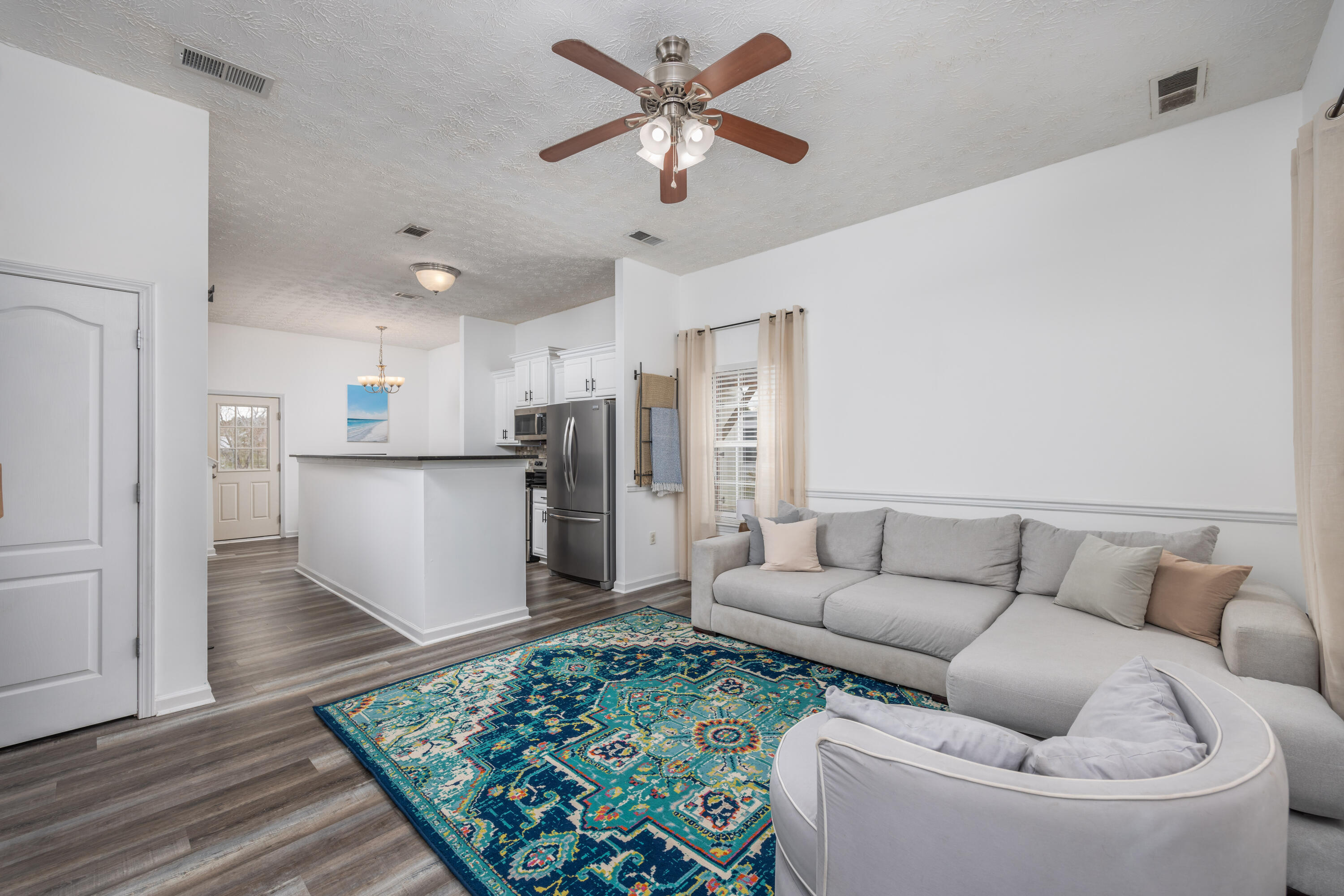 75 Mallot Beach Drive Freeport, FL 32439 - Photo 5 of 25 a living room with furniture and a rug