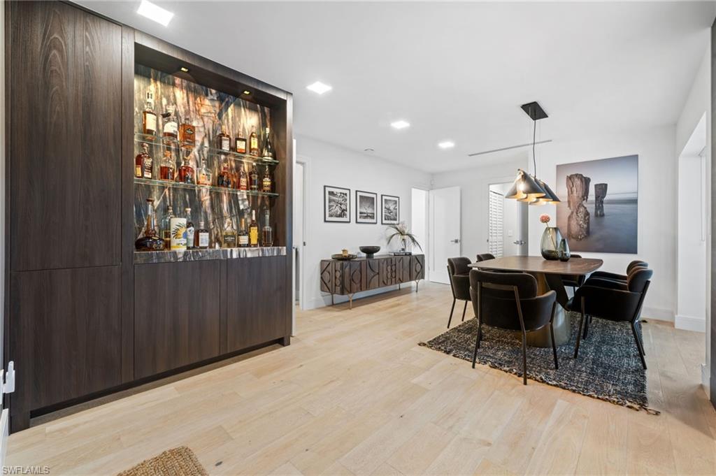 304 Nason Lane Naples, FL 34112 - Photo 12 of 43 a view of a dining room with furniture window and outside view