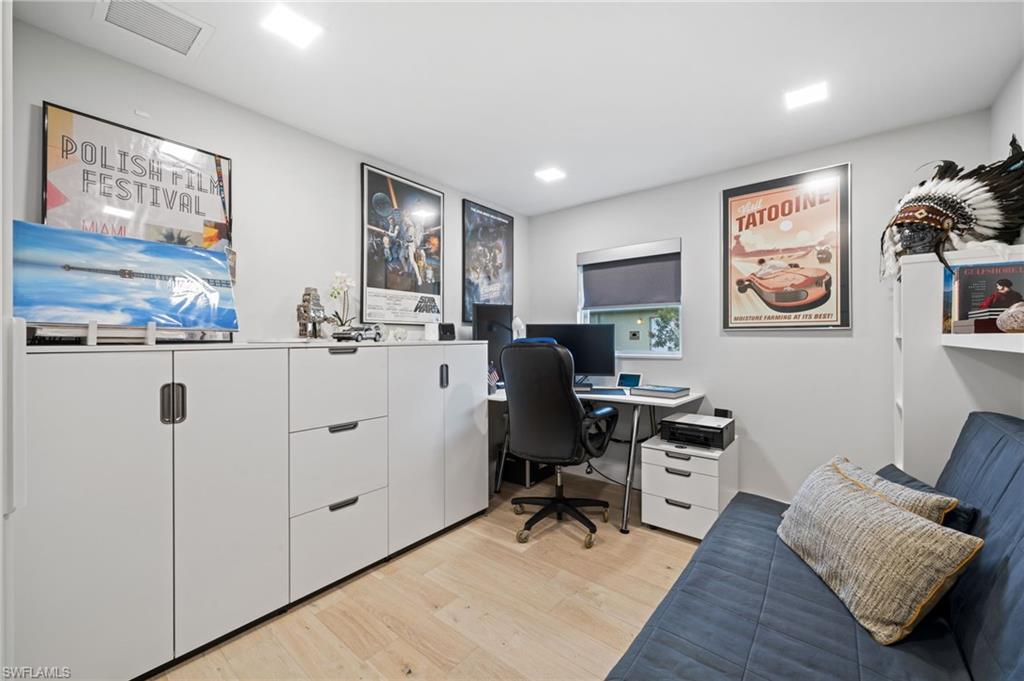 304 Nason Lane Naples, FL 34112 - Photo 28 of 43 a view of a workspace with furniture and a window