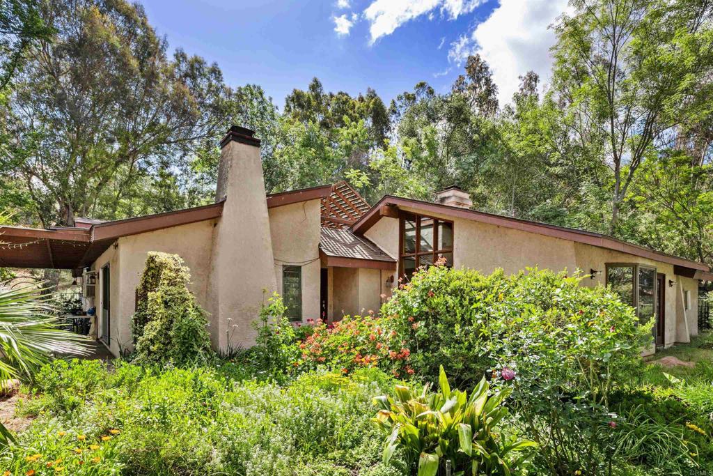 29560 Lilac Road Valley Center, CA 92082 - Photo 2 of 43 a backyard of a house with lots of green space