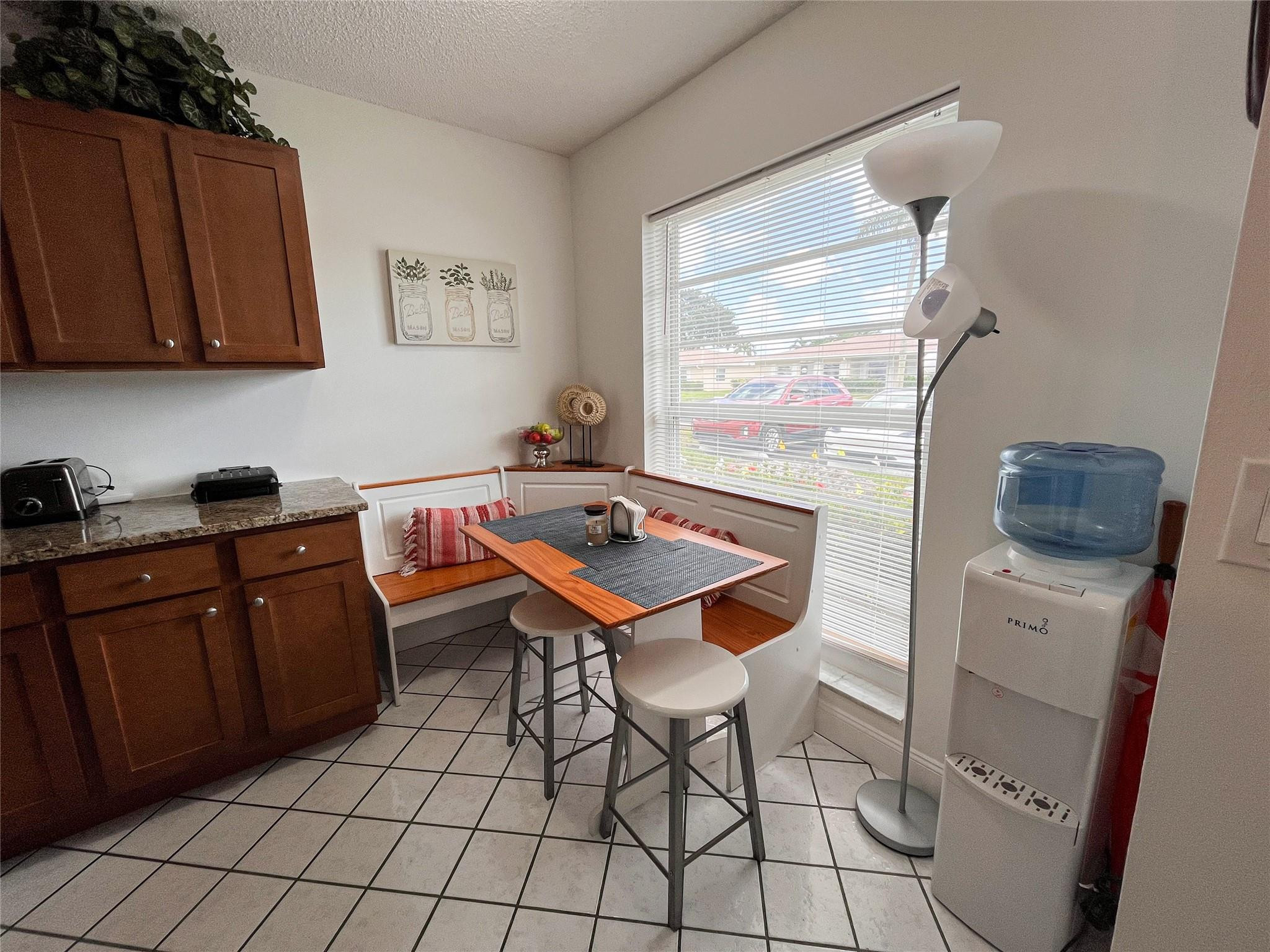 20932 Sedgewick Drive, Unit 400 Boca Raton, FL 33433 - Photo 12 of 34 a room with furniture a rug and a window