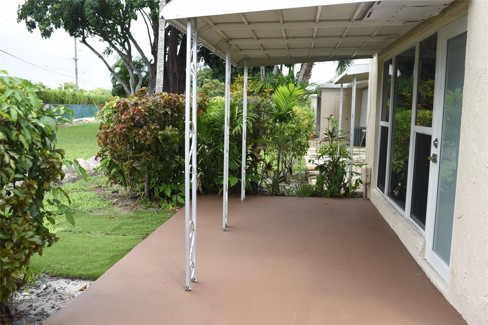 20932 Sedgewick Drive, Unit 400 Boca Raton, FL 33433 - Photo 28 of 34 a view of a backyard with garden