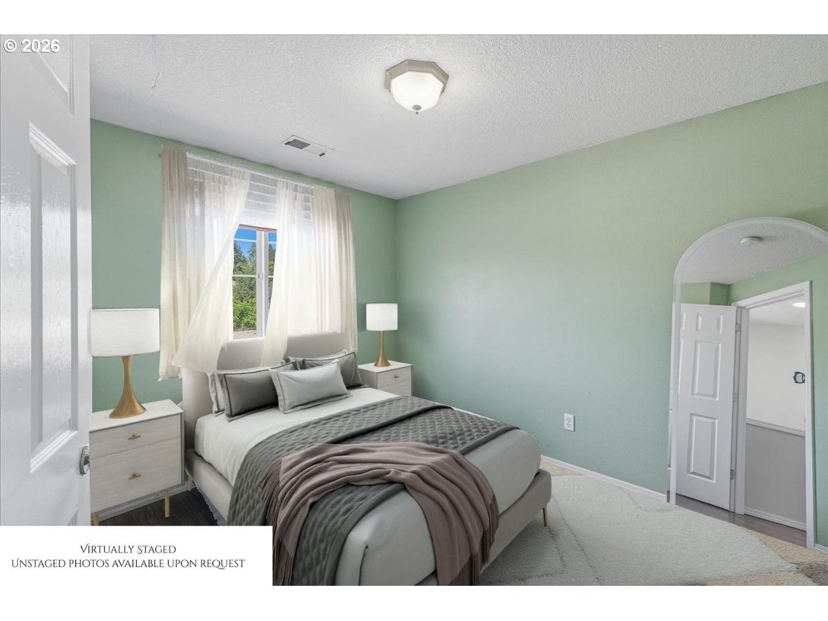 19240 Southwest Rosedale Court Beaverton, OR 97007 - Photo 21 of 38 a bedroom with a bed and a window