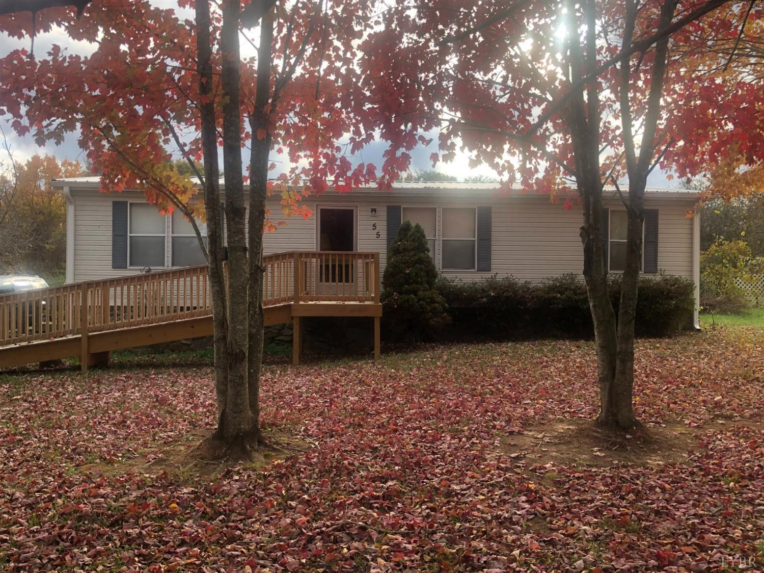 a house view with a backyard space
