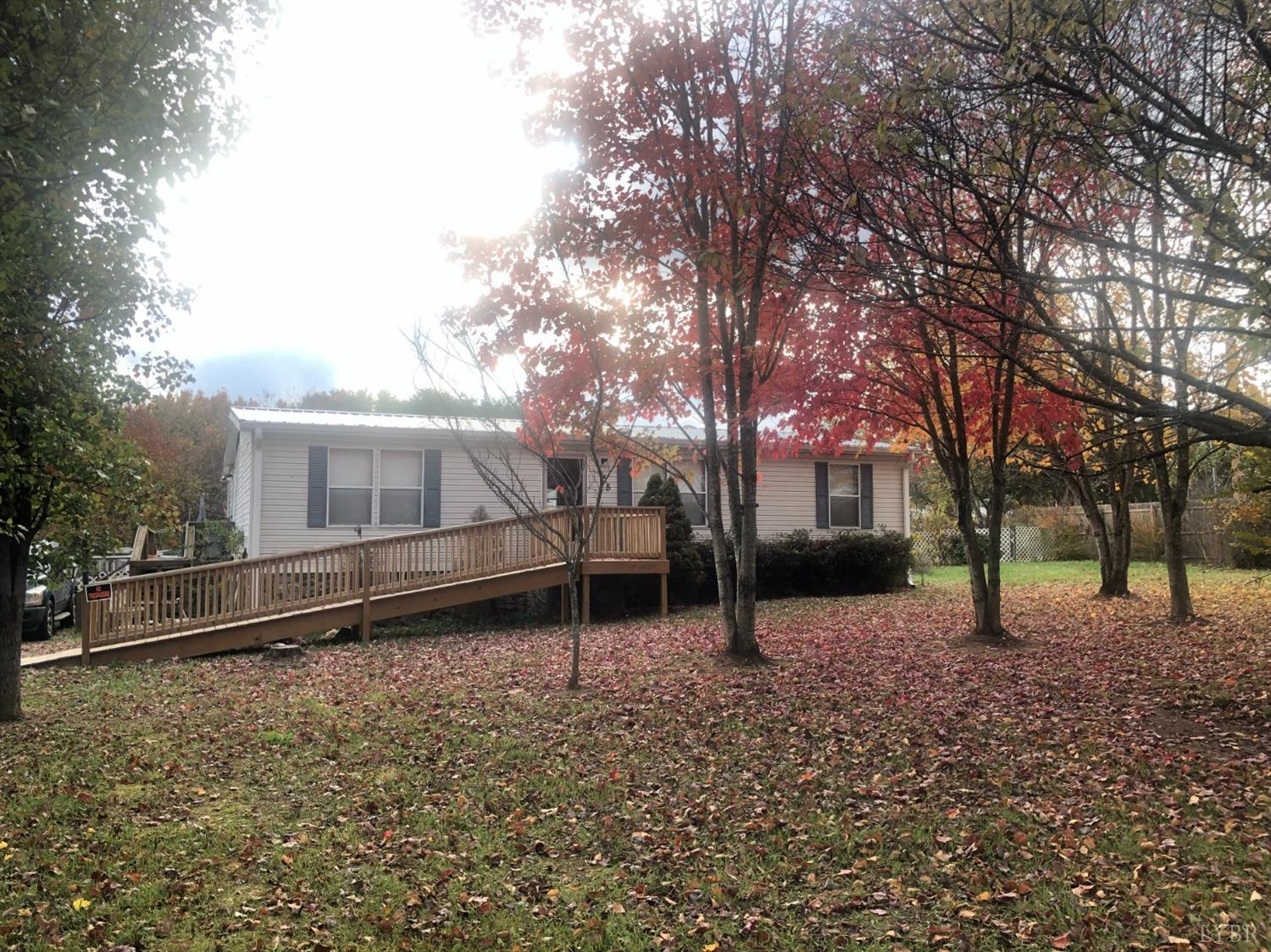 55 Carwile Road Rustburg, VA 24588 - Photo 3 of 10 a backyard of a house with lots of green space