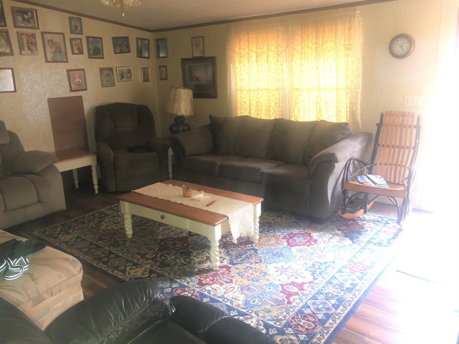 55 Carwile Road Rustburg, VA 24588 - Photo 5 of 10 a living room with furniture and a window