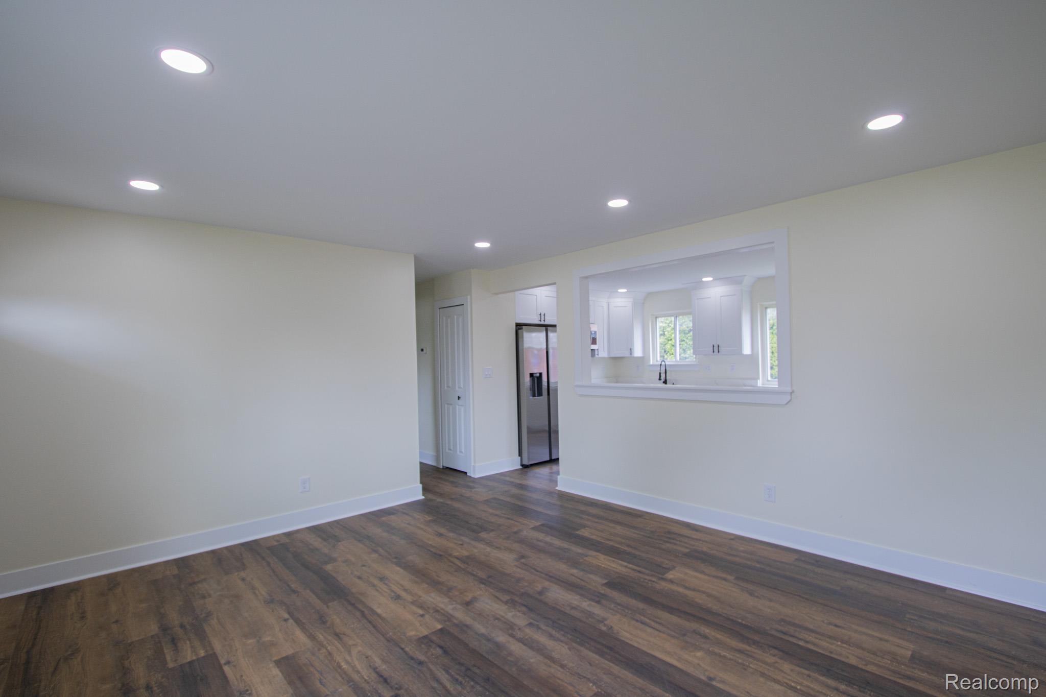 31000 Fall Fraser, MI 48026 - Photo 8 of 28 Unfurnished room featuring dark wood-style floors and recessed lighting