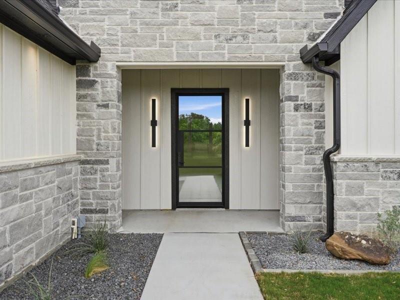 275 Latigo Way Weatherford, TX 76088 - Photo 3 of 39 ENTRY STEEL DOOR
