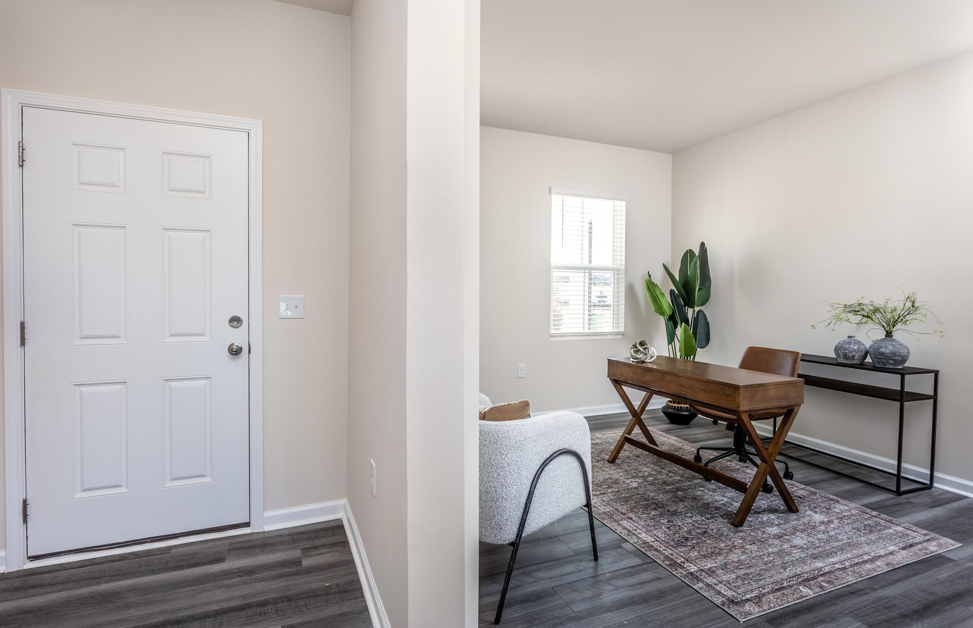 1725 Luna Way Raleigh, NC 27604 - Photo 2 of 19 a workspace room with furniture and wooden floor