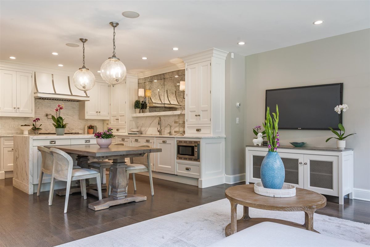 62 Woodley Road Winnetka, IL 60093 - Photo 13 of 43 a large kitchen with a table and chairs in it