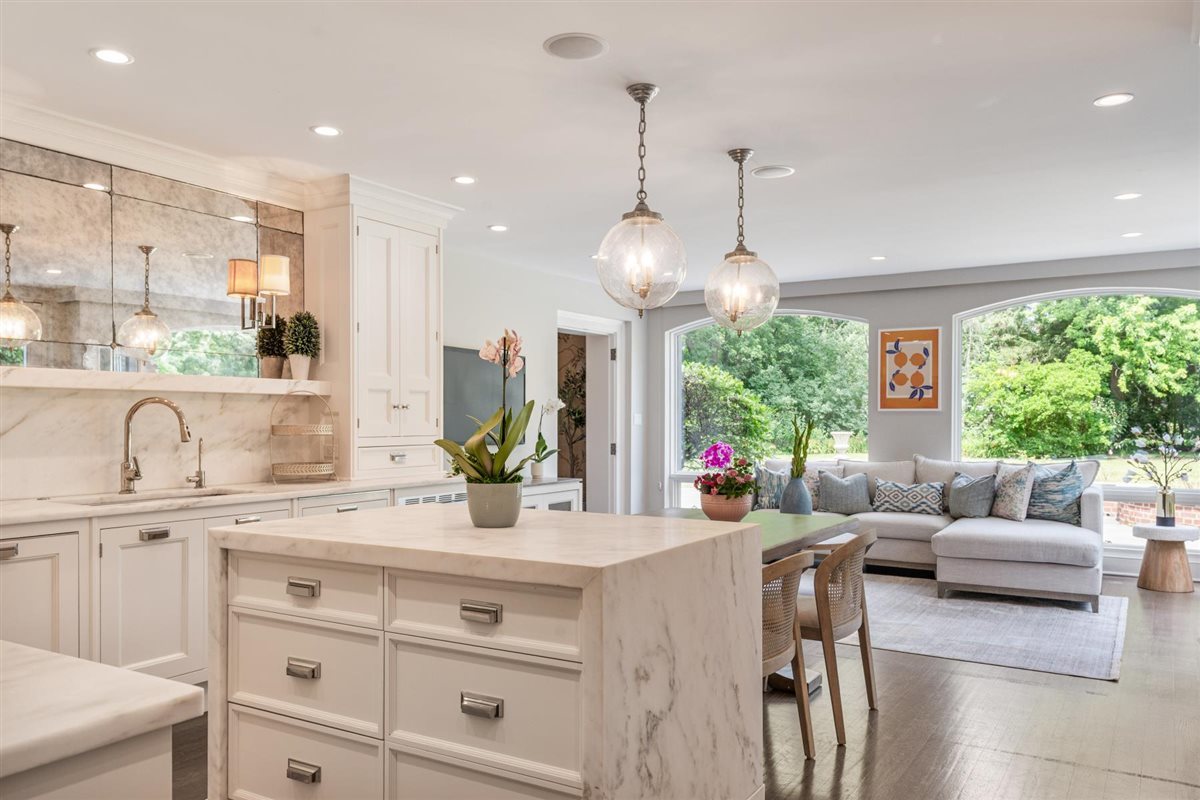 62 Woodley Road Winnetka, IL 60093 - Photo 15 of 43 a view of a kitchen with kitchen island granite countertop a large island in the center
