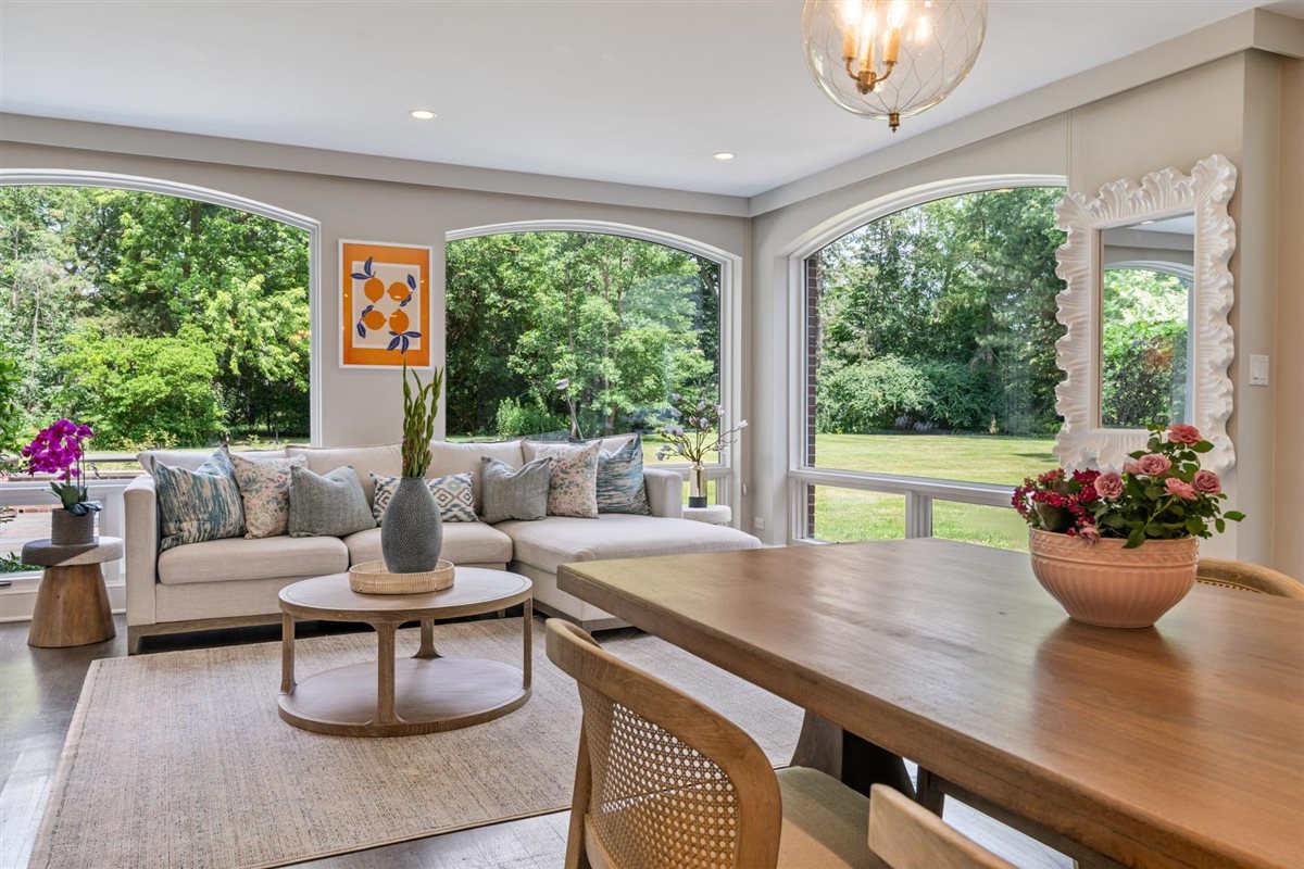 62 Woodley Road Winnetka, IL 60093 - Photo 16 of 43 a living room with furniture and a potted plant