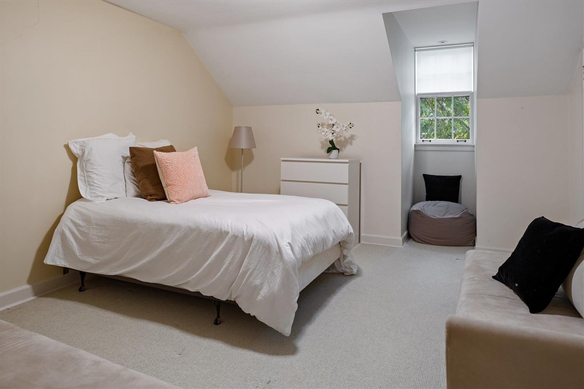 62 Woodley Road Winnetka, IL 60093 - Photo 35 of 43 a bedroom with a bed and window
