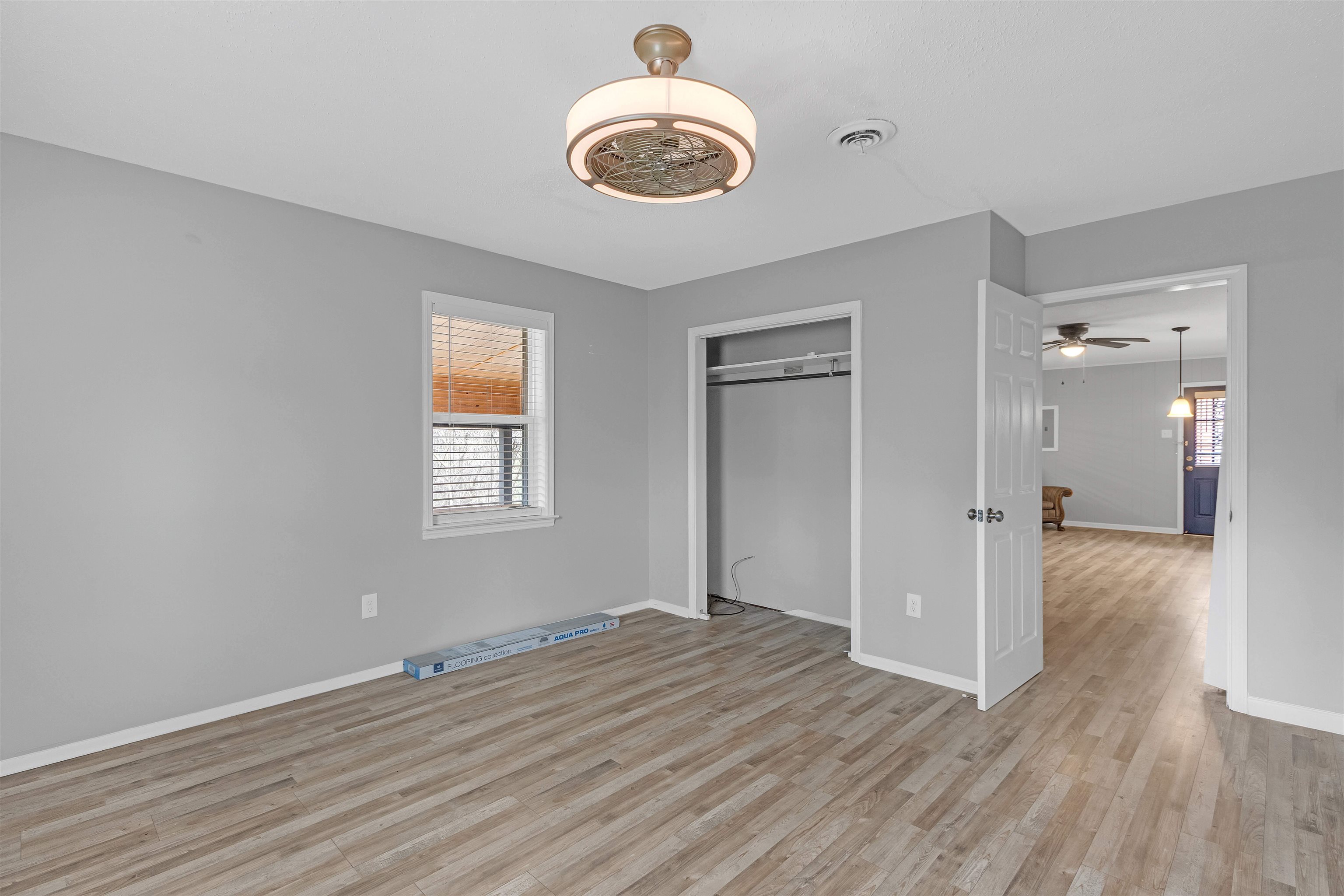 1303 Inman Road Memphis, TN 38111 - Photo 11 of 12 Unfurnished bedroom with visible vents, multiple windows, and wood finished floors