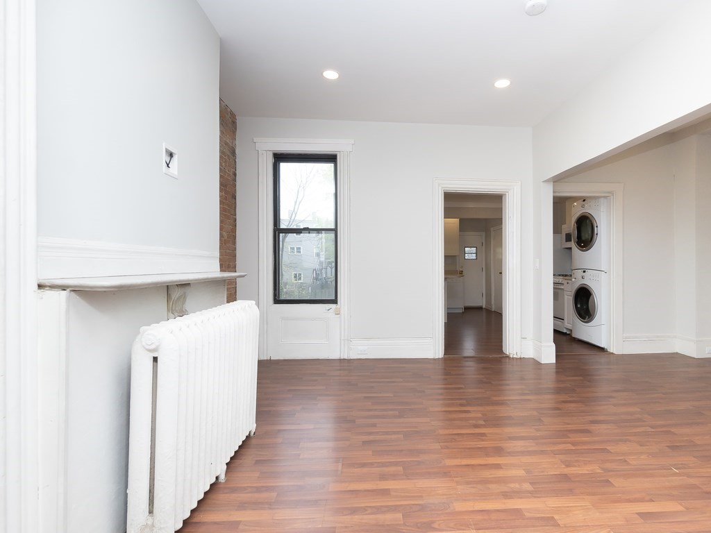 289 Meridian Street, Unit 2 Boston, MA 02128 - Photo 3 of 16 a view of empty room with wooden floor
