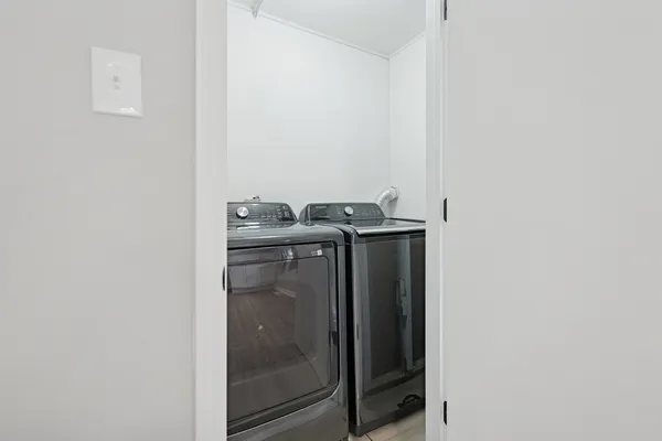 a utility room with dryer and washer