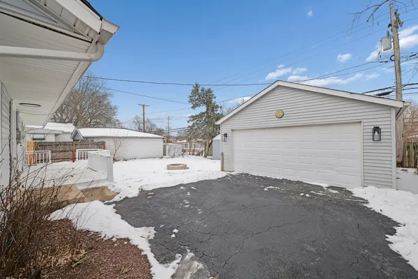 a view of a backyard of the house