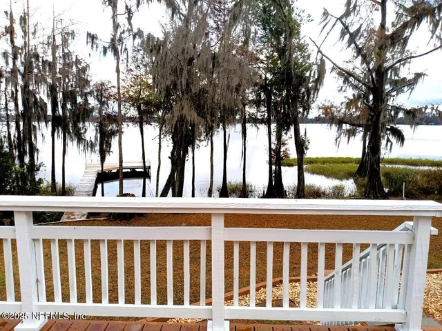 a view of a street with wooden deck