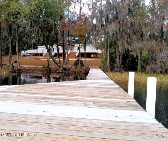 a house with trees in front of it