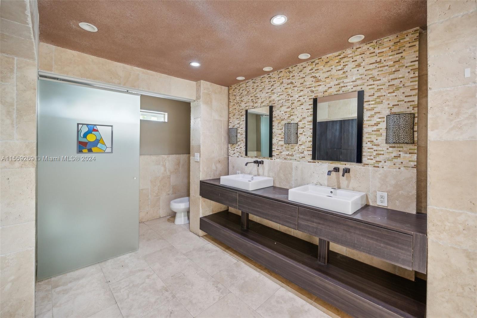 10240 Southwest 124th Street Miami, FL 33176 - Photo 19 of 81 a bathroom with a double vanity sink and a mirror