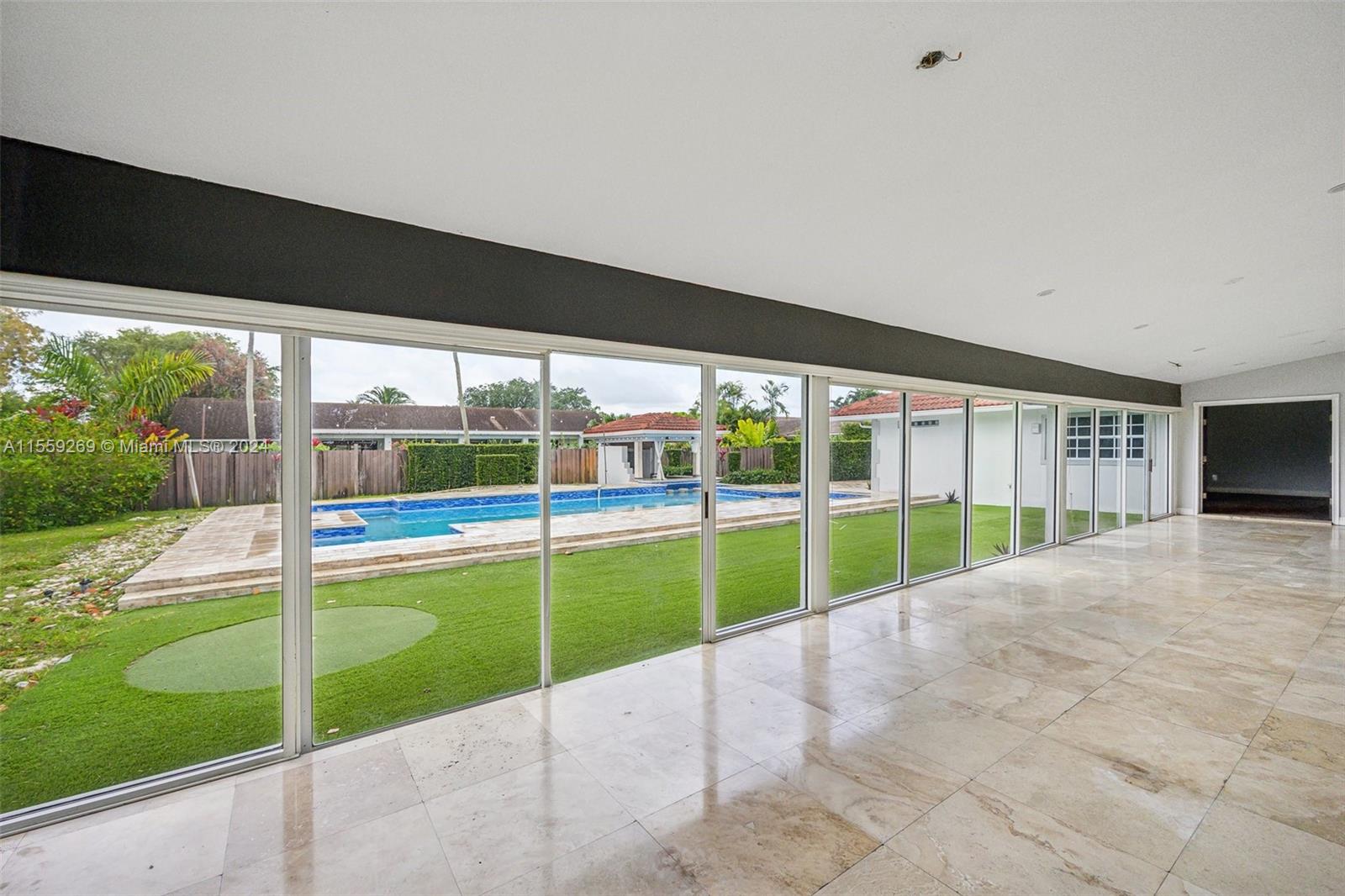 10240 Southwest 124th Street Miami, FL 33176 - Photo 26 of 81 a view of swimming pool with a yard
