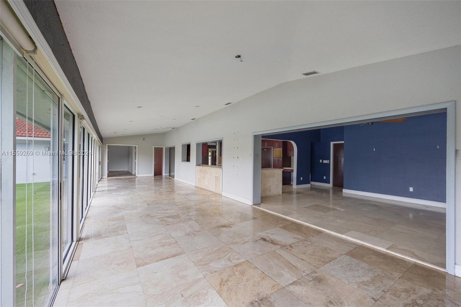 10240 Southwest 124th Street Miami, FL 33176 - Photo 27 of 81 a view of a big room with windows and entryway