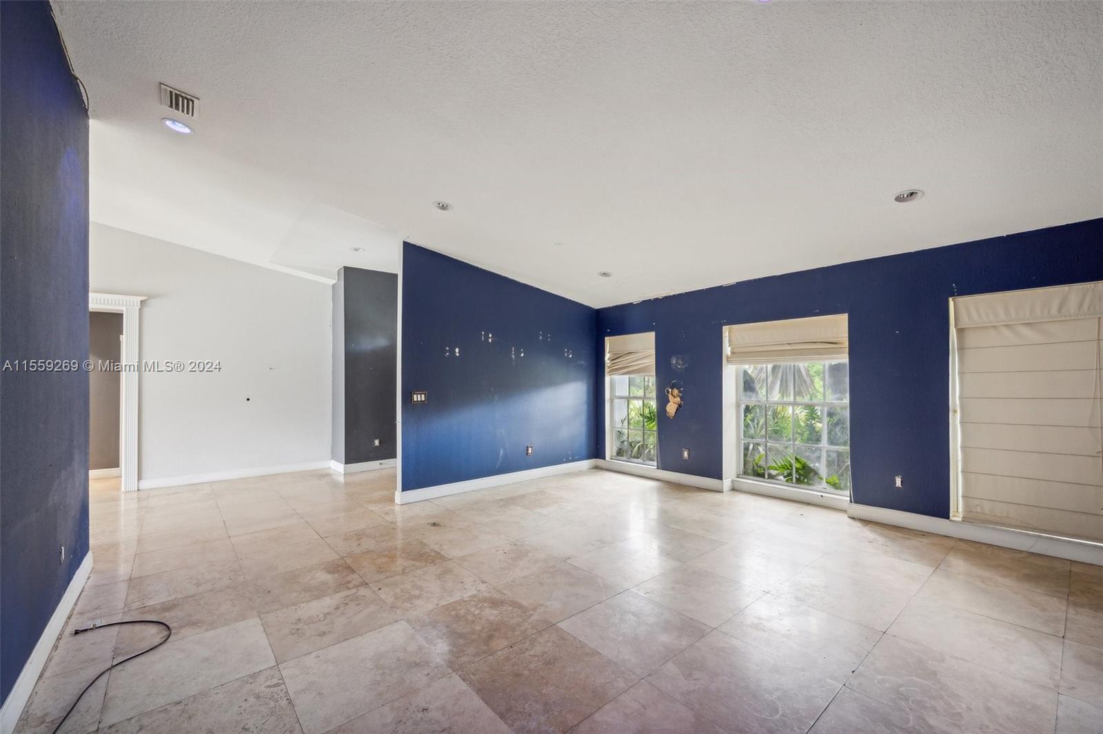 10240 Southwest 124th Street Miami, FL 33176 - Photo 28 of 81 a view of an empty room with a fireplace and window